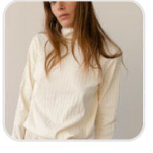 DONNI. 'The Pointelle Turtleneck'
